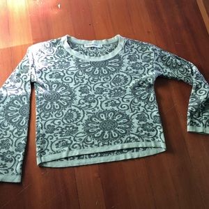 Warm cropped long sleeve sweater. Made in the USA